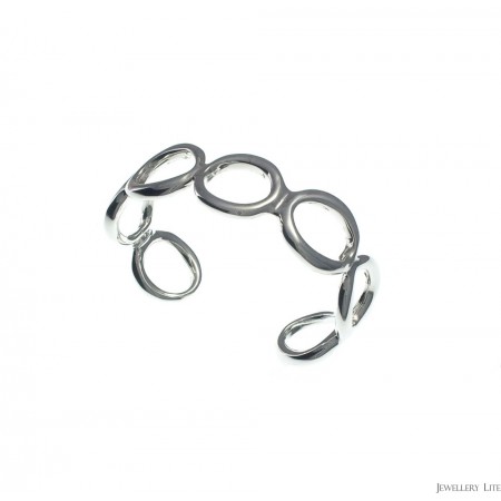 http://www.jewellerylite.com/175-760-thickbox/silver-round-cutouts-cuff.jpg