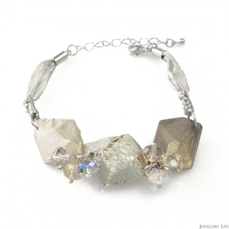 http://www.jewellerylite.com/217-882-thickbox/ash-gray-buds-bracelet.jpg